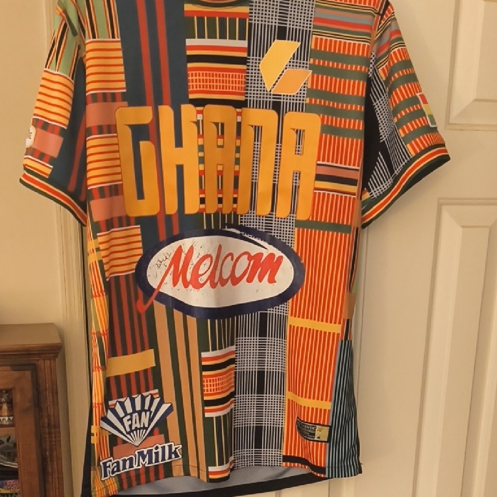 Vibrant Orange and Yellow Jersey with Geometric Print
